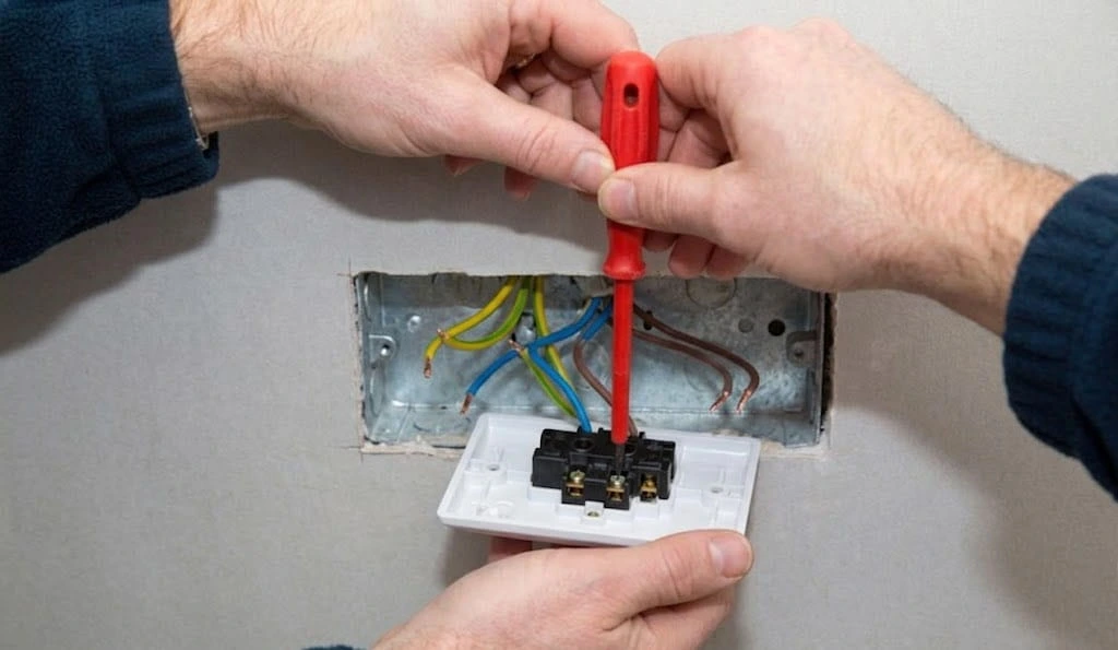 Electrical socket and switch fixing